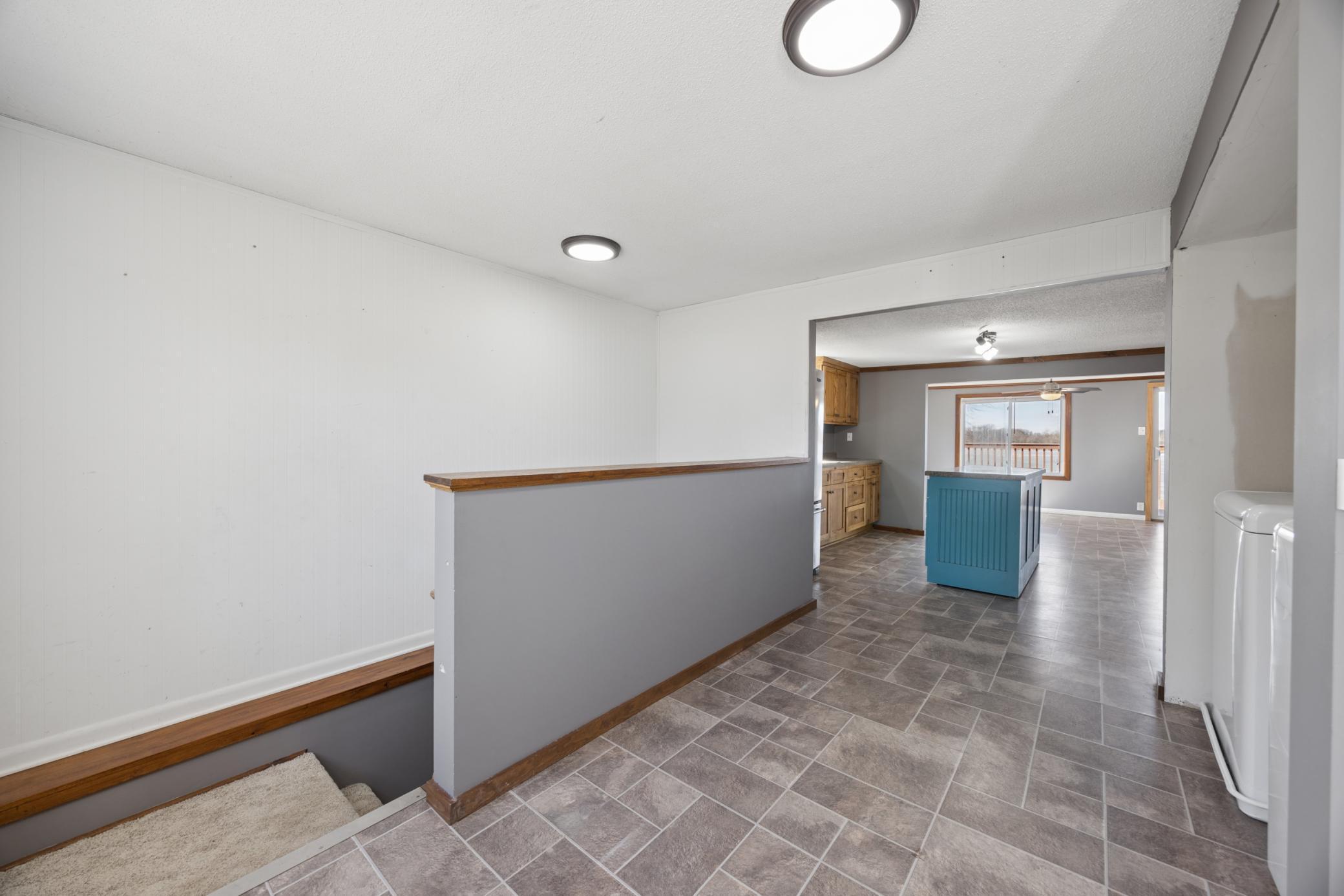 Enjoy the ease of main floor living with the bedroom, full bathroom, and laundry all conveniently located on one level.