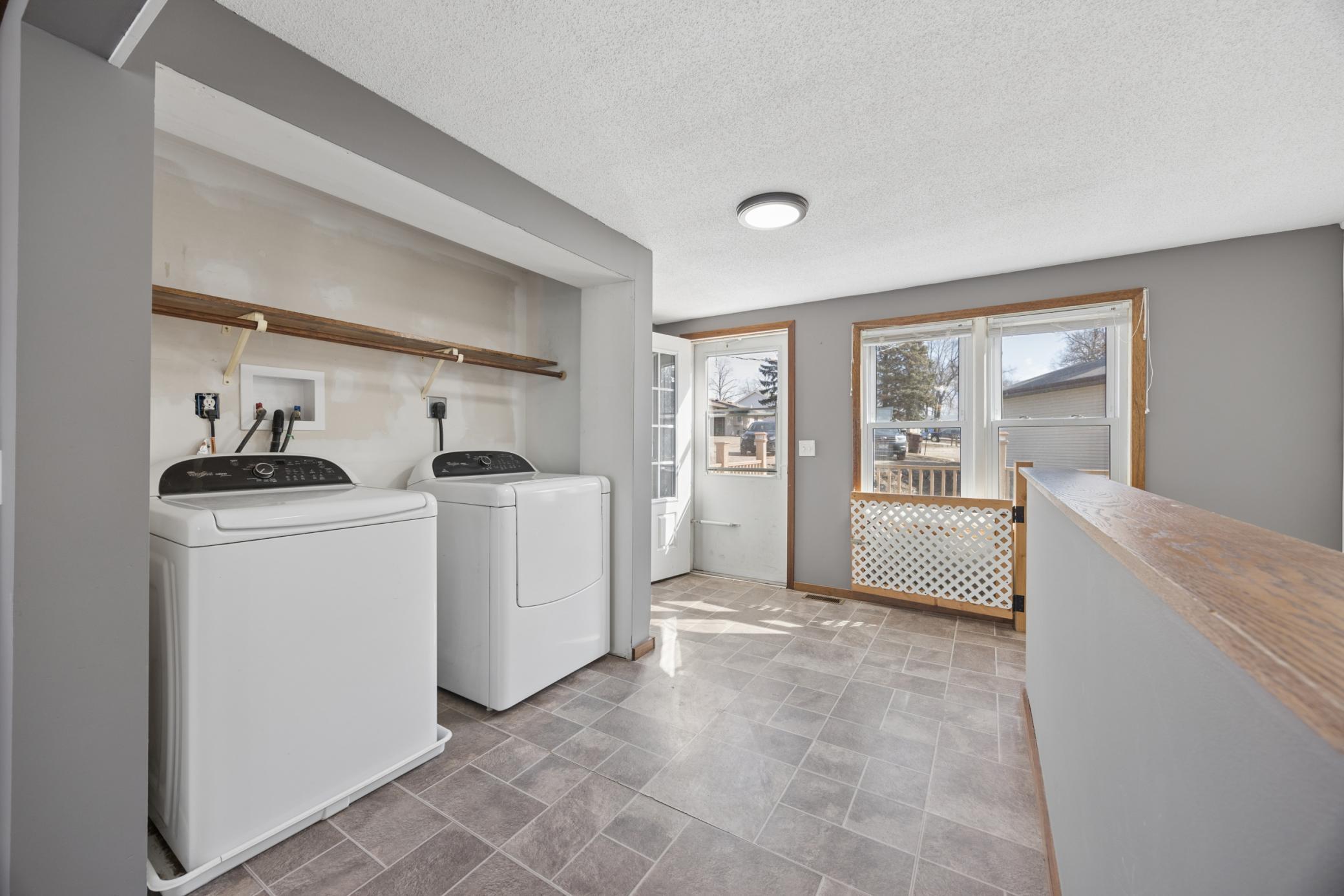Main floor laundry adds everyday convenience and makes lake living easy and comfortable.