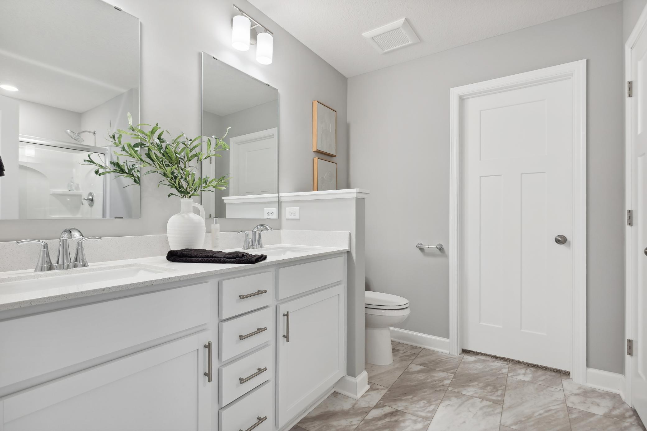 Dual sinks and a walk-in closet will simplify morning and evening routines