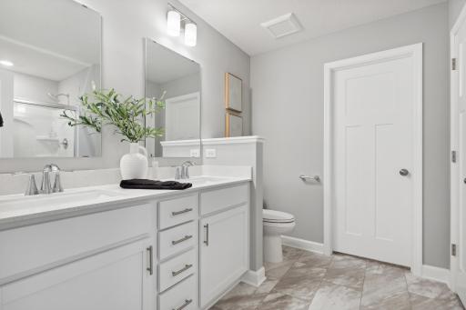Dual sinks and a walk-in closet will simplify morning and evening routines