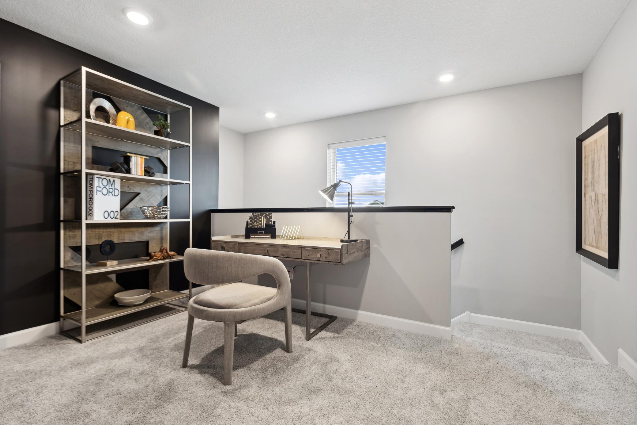The upstairs secondary bedrooms center around a loft, which serves as an additional shared living space.
