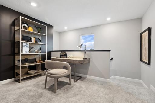 The upstairs secondary bedrooms center around a loft, which serves as an additional shared living space.