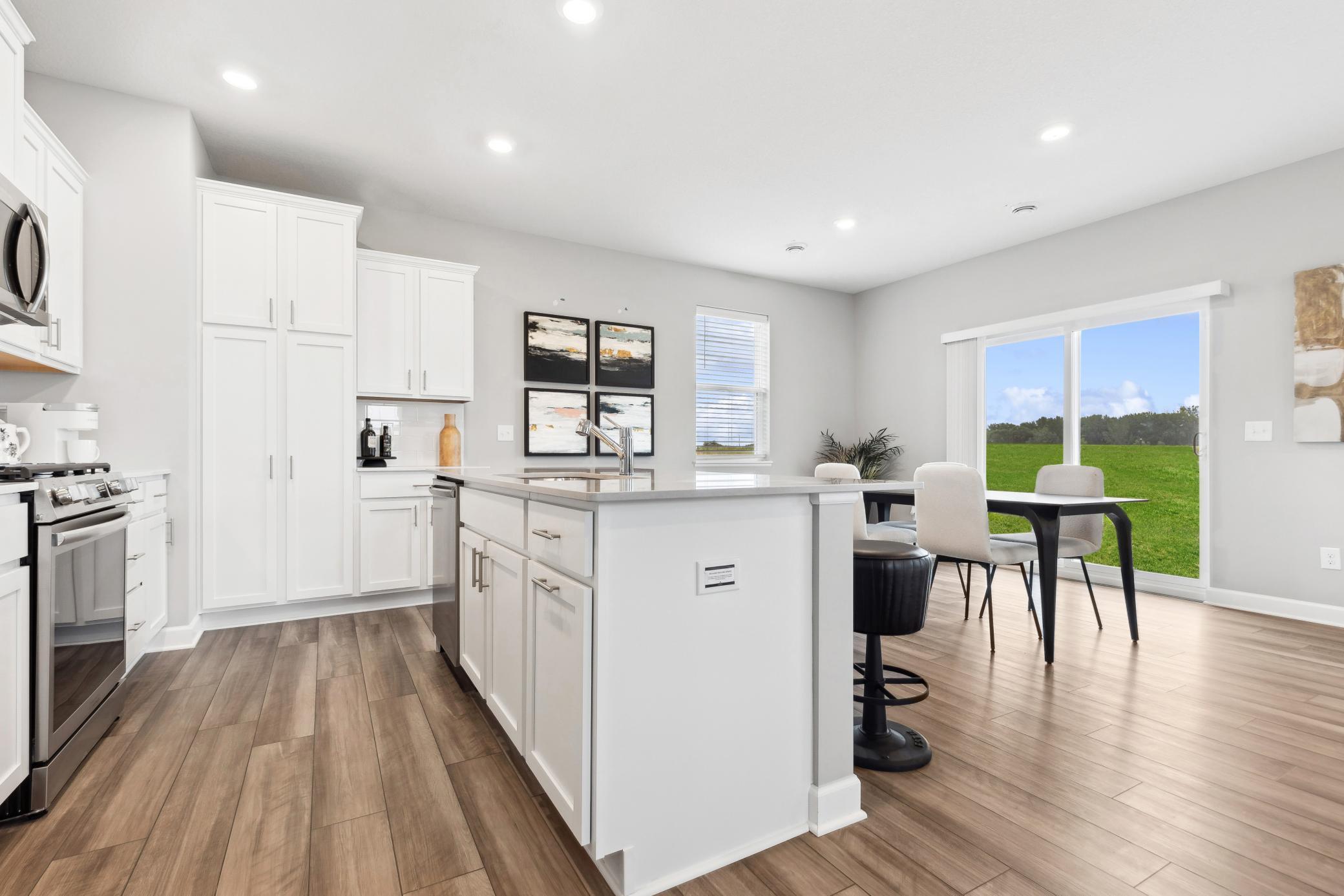 The kitchen overlooks the dining area for easy entertaining