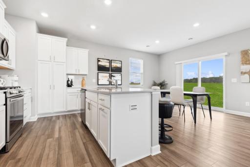 The kitchen overlooks the dining area for easy entertaining