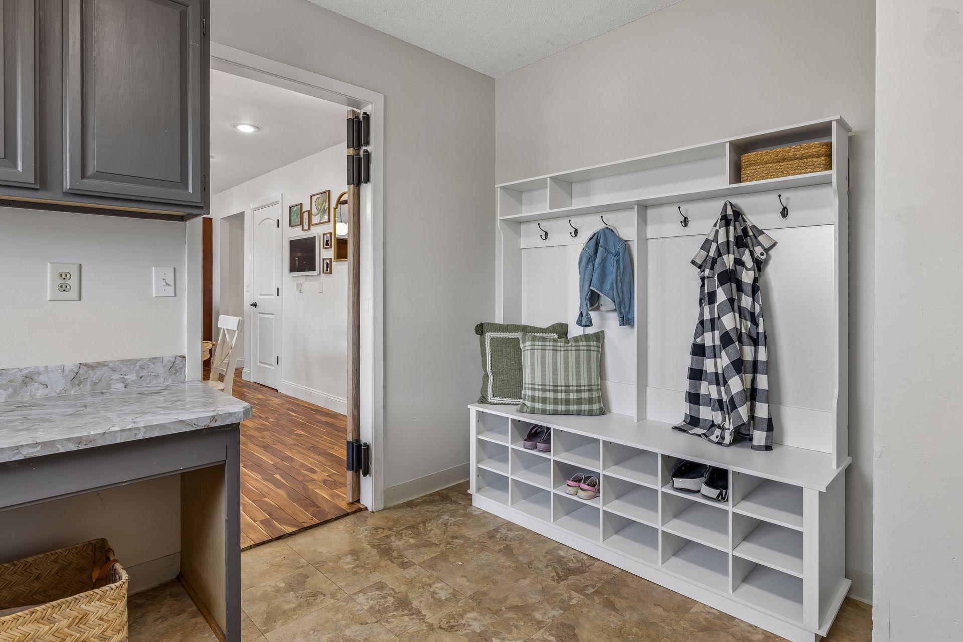 Laundry/mudroom has cubbies making keeping all those coats and shoes out of the way a breeze.