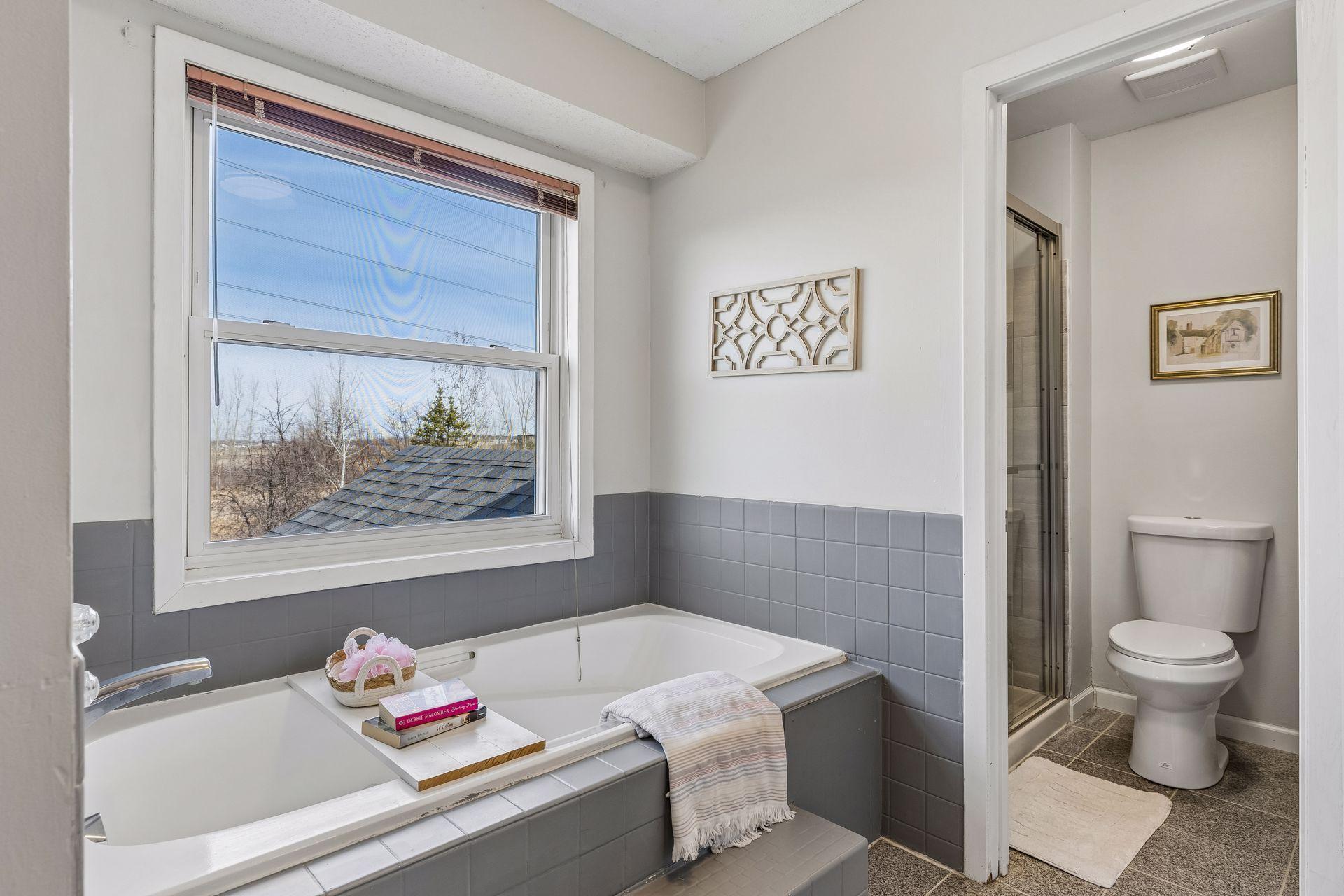 Take a moment to relax in this inviting tub.