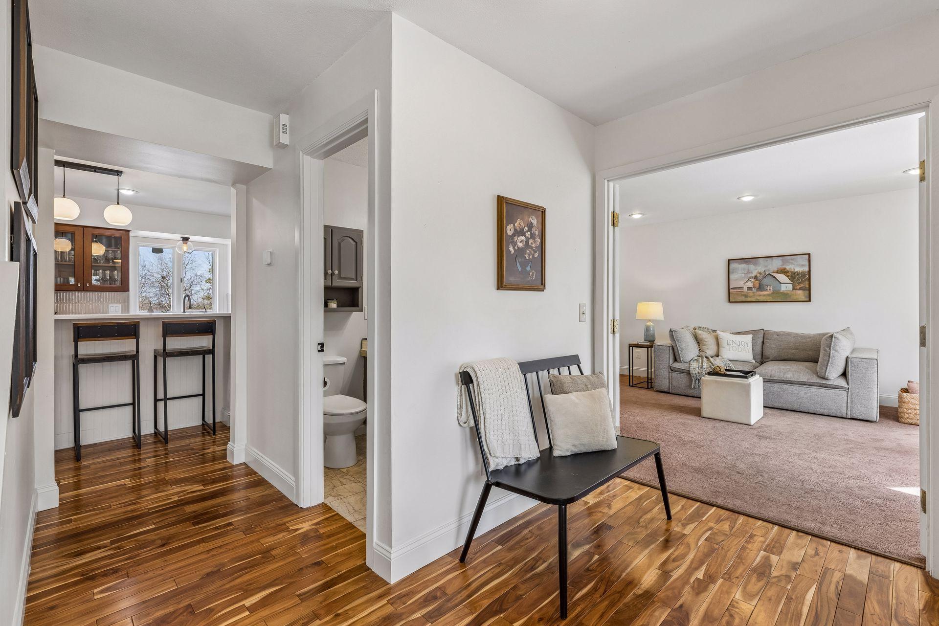 Stunning hardwoods welcome you inside.