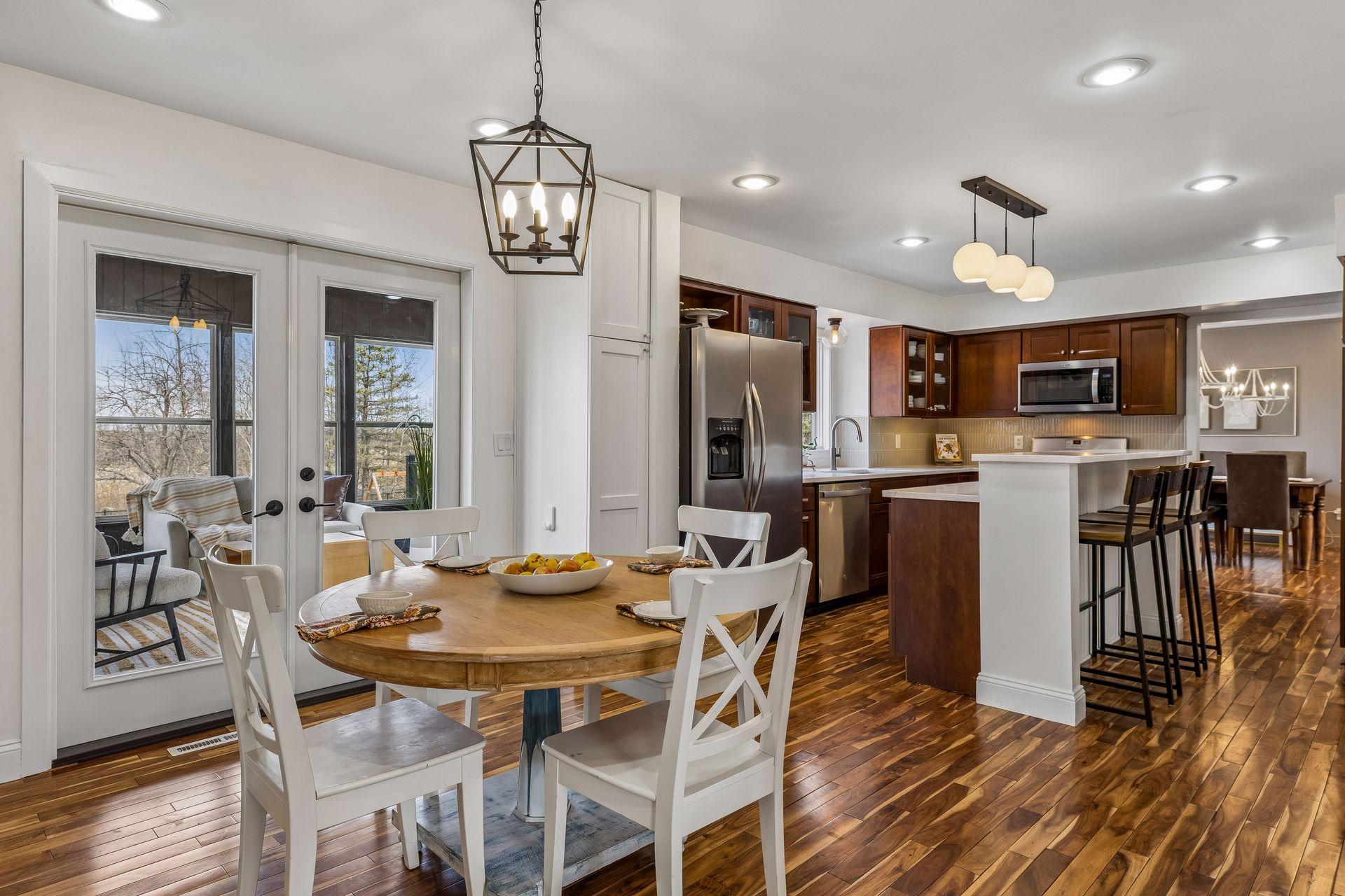 Kitchen flows from porch to deck and even into the formal dining making this a wonderful space for entertaining.