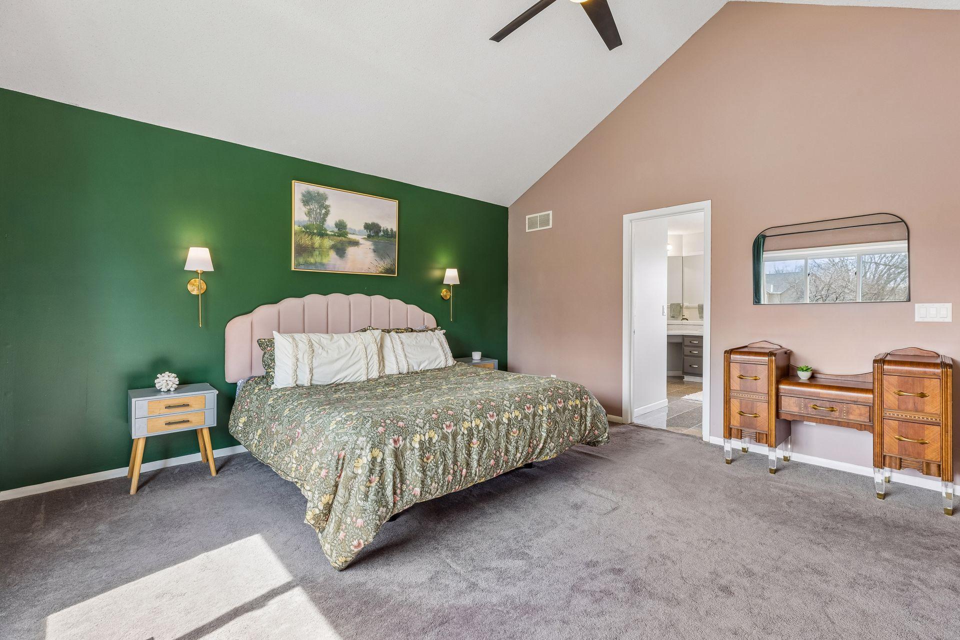 Primary has an ensuite bath and his and hers walk-in closets.