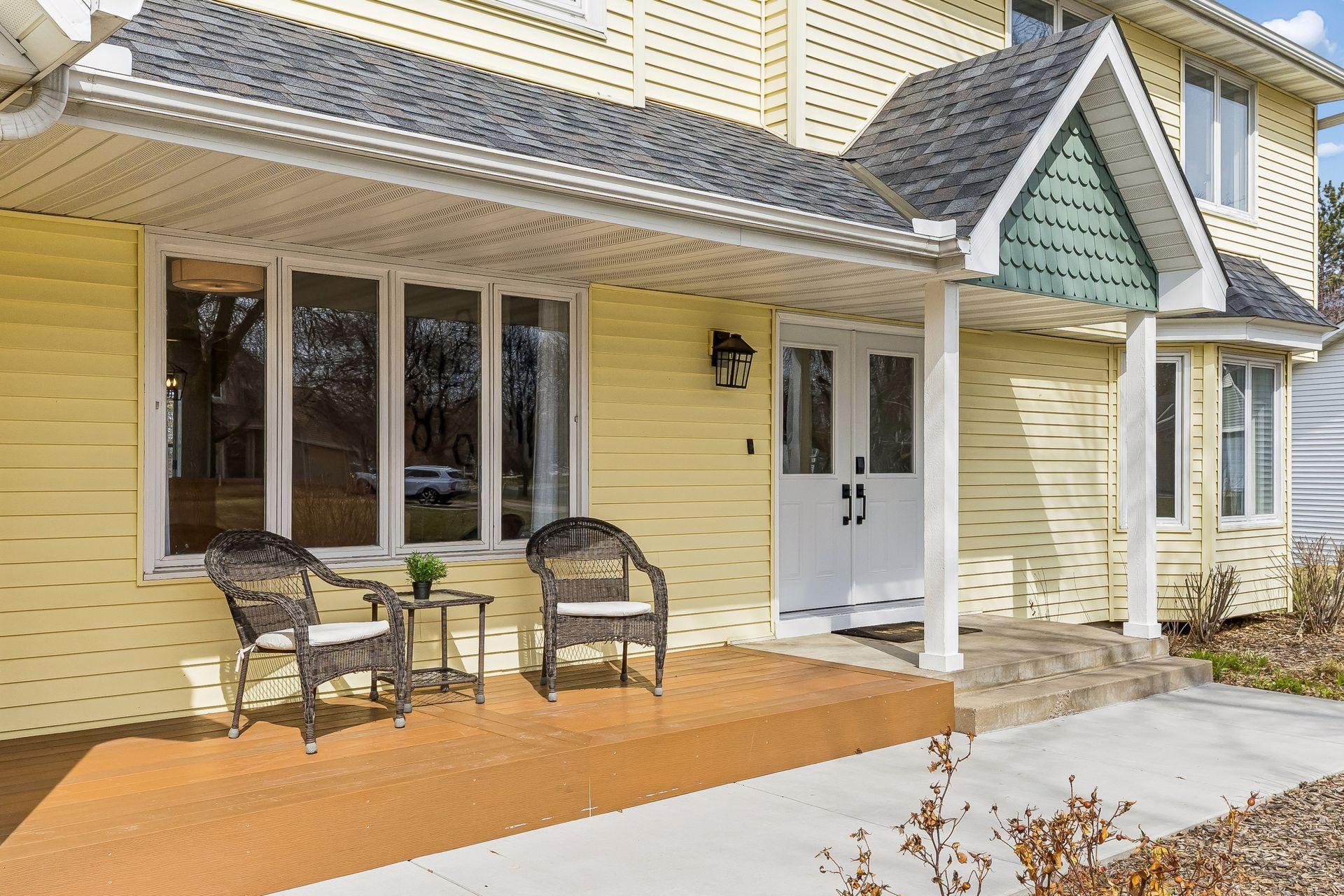 A new sidewalk, front doors, and porch welcome you into this beautiful home.
