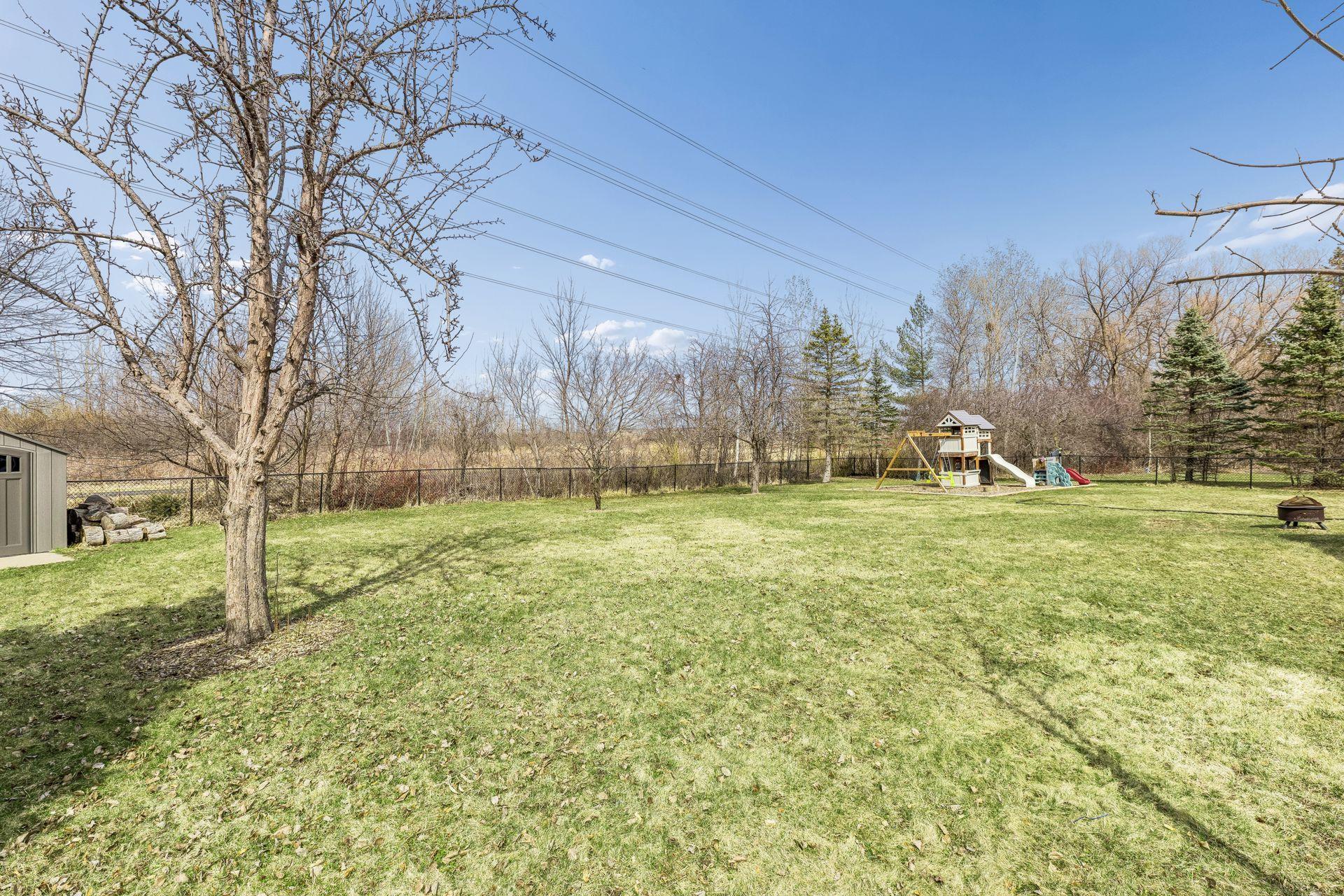 Huge, flat, private lot that backs up to a biking/walking trail.