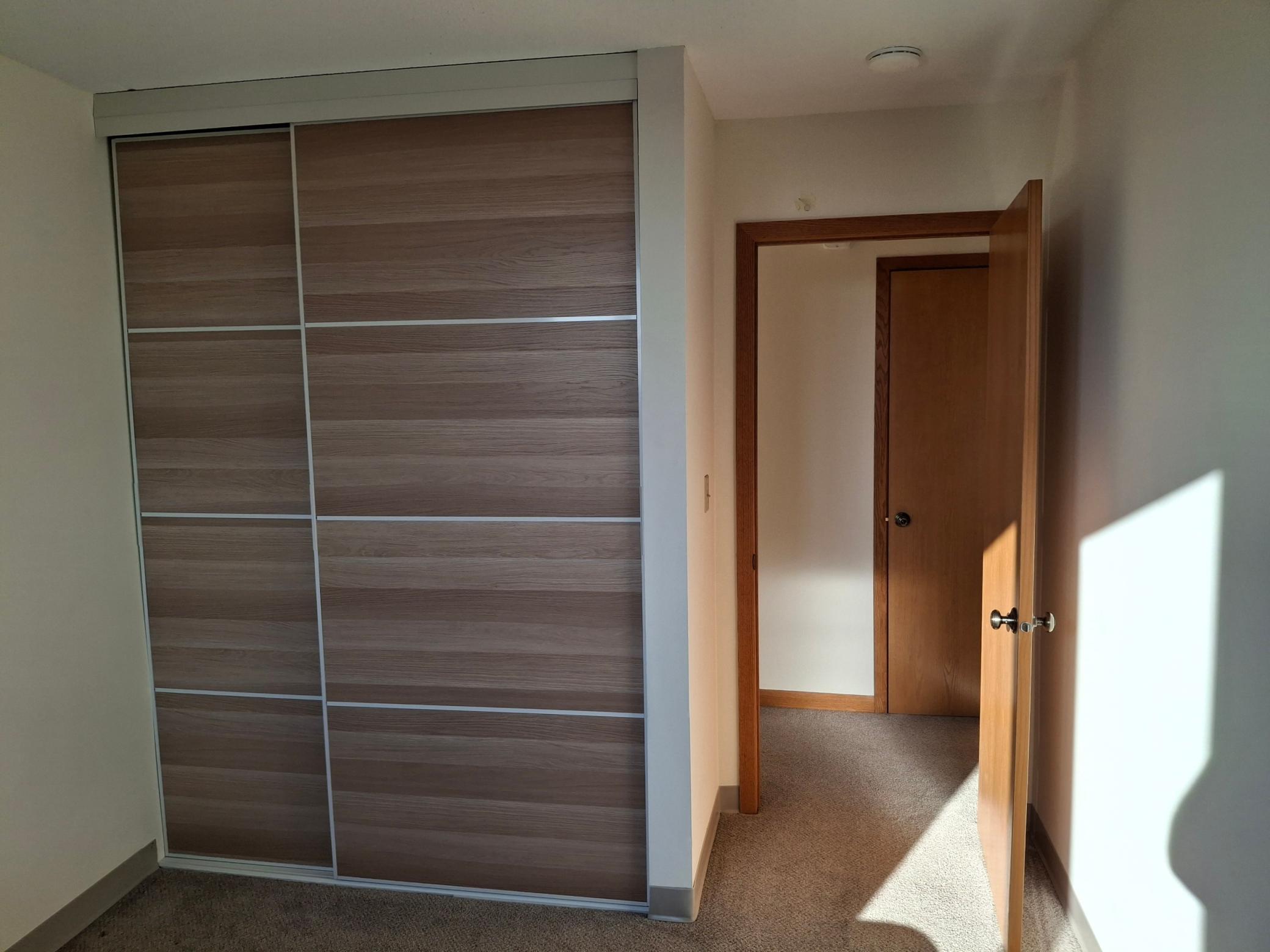 Bedroom 1 - sliding closet doors