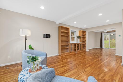 Beautiful Amish locust wood flooring adds warmth and character to the main living spaces.