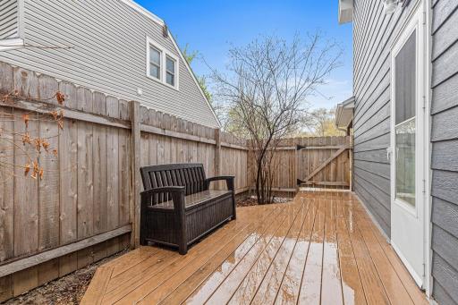 Large, wrap around maintenance free deck off the side of the home.