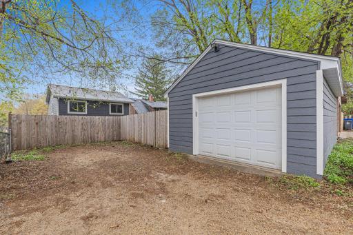 Oversized single car garage and two outdoor parking spaces.