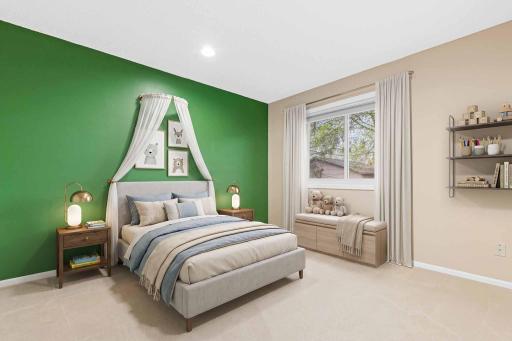 One of three bright and comfortable bedrooms on the upper level. This one overlooks the backyard and is located near the full bathroom. Visually staged.