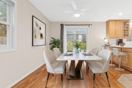 Dining space with great natural light and easy access to outdoor entertaining. Visually staged.