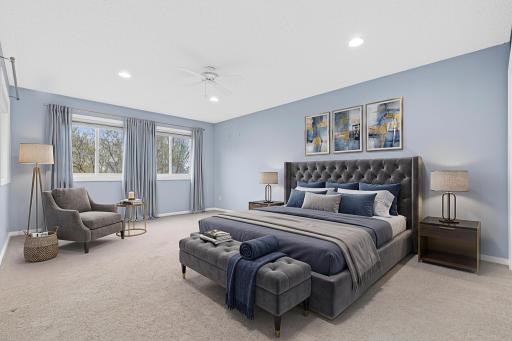 Upstairs is an oversized owner's suite with walk-thru full bathroom and abundant closet space. Visually staged.