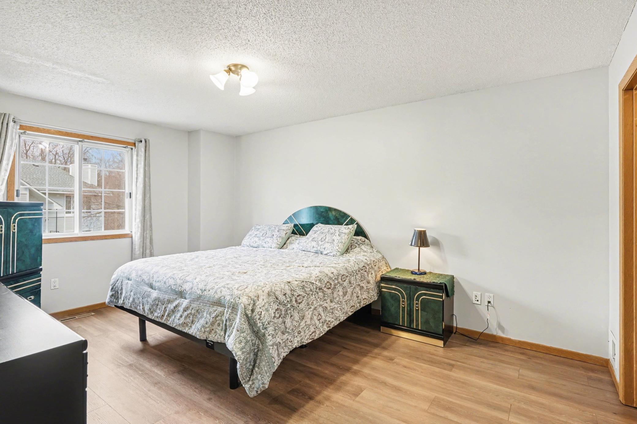 Cozy and versatile second bedroom—perfect for guests, a home office, or additional living space, featuring natural light and a clean, move-in ready feel.