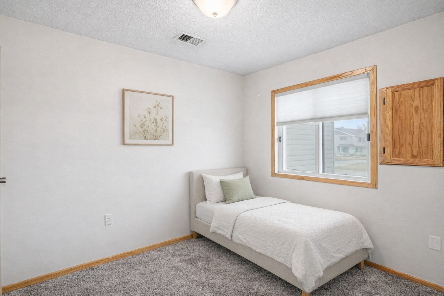 Minimalistic bedroom with natural accents.png