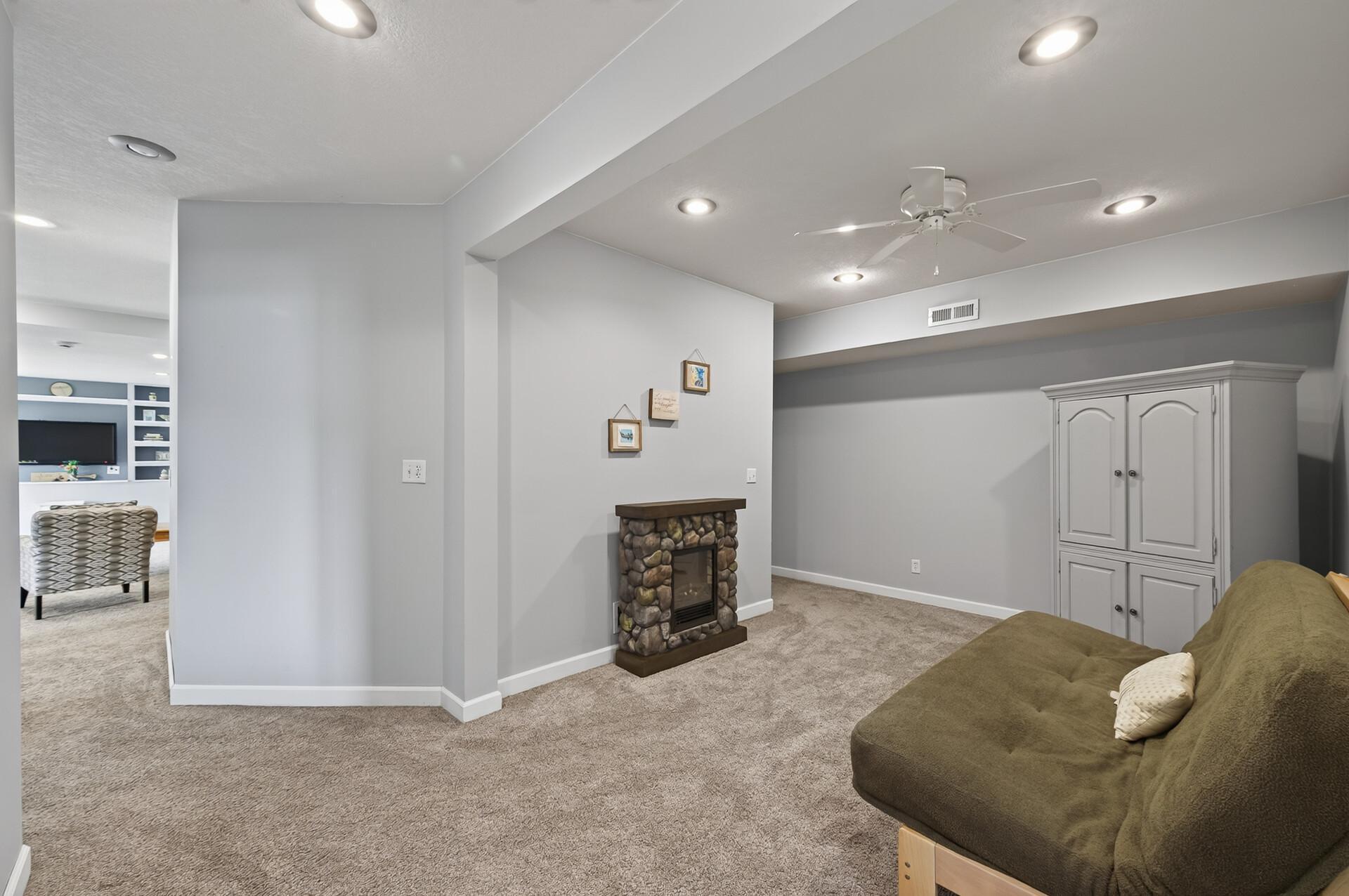 Lower level sitting area, great spot for crafts or for reading.