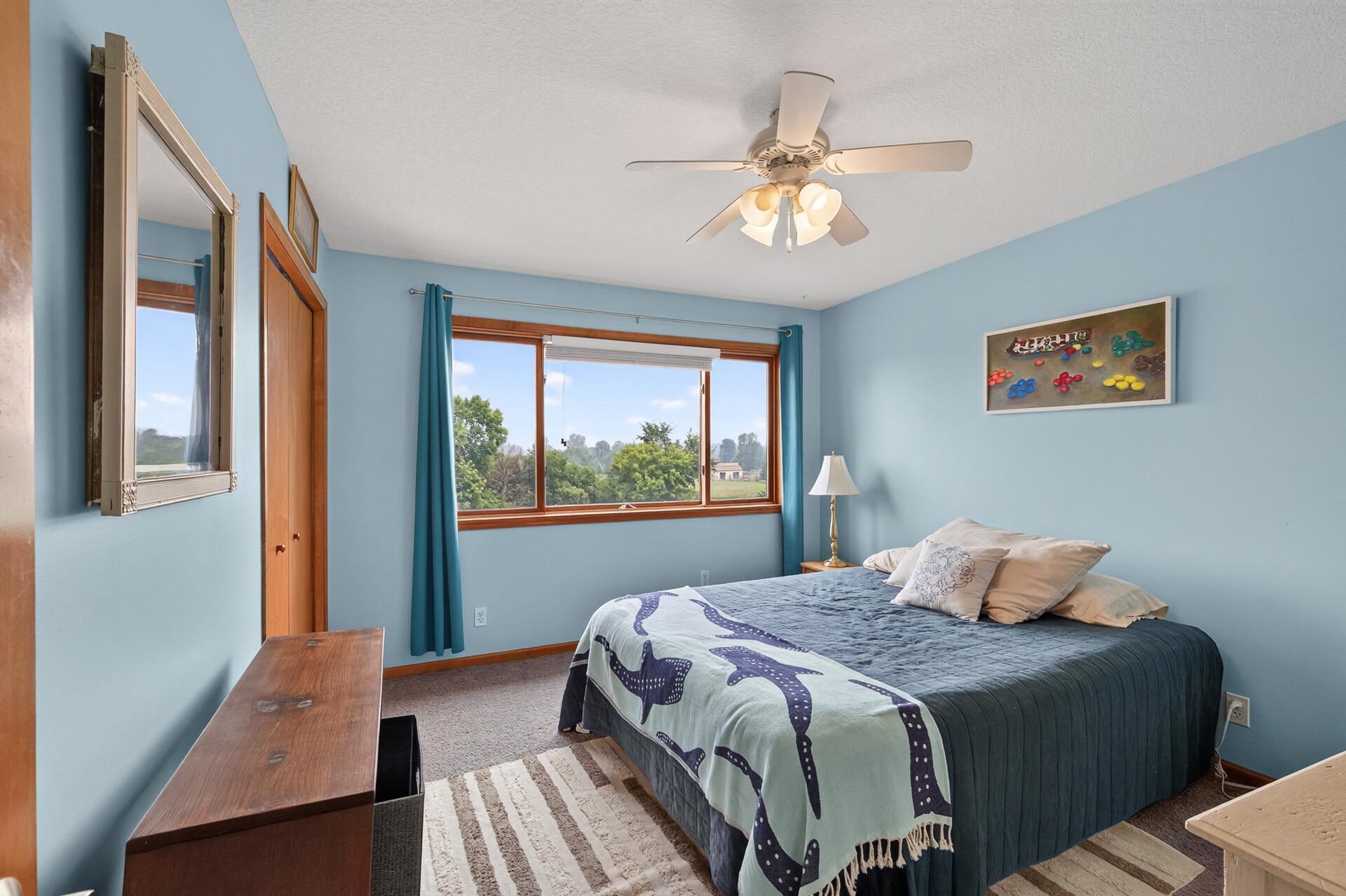 1 of 3 upper bedrooms.