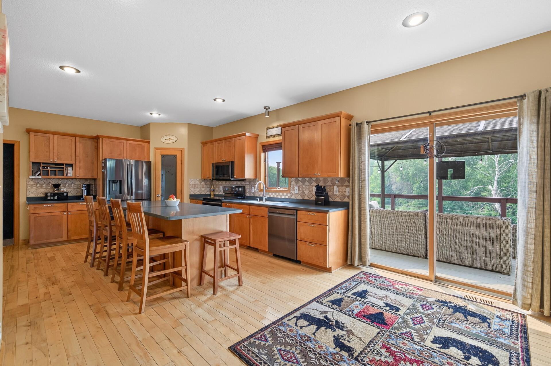 A great kitchen with plenty of natural lighting and a widow to view the backside of home.