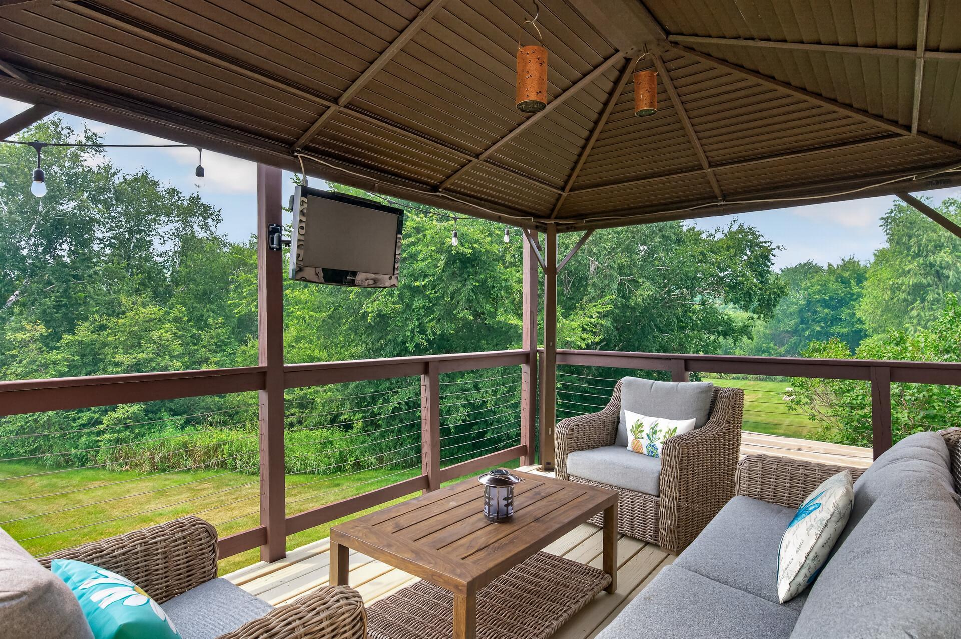 Back deck with covered pagoda.