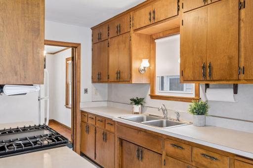 Cabinetry extends all the way to the ceiling.