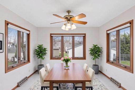 This fantastic room is surrounded by windows with tons of natural light.