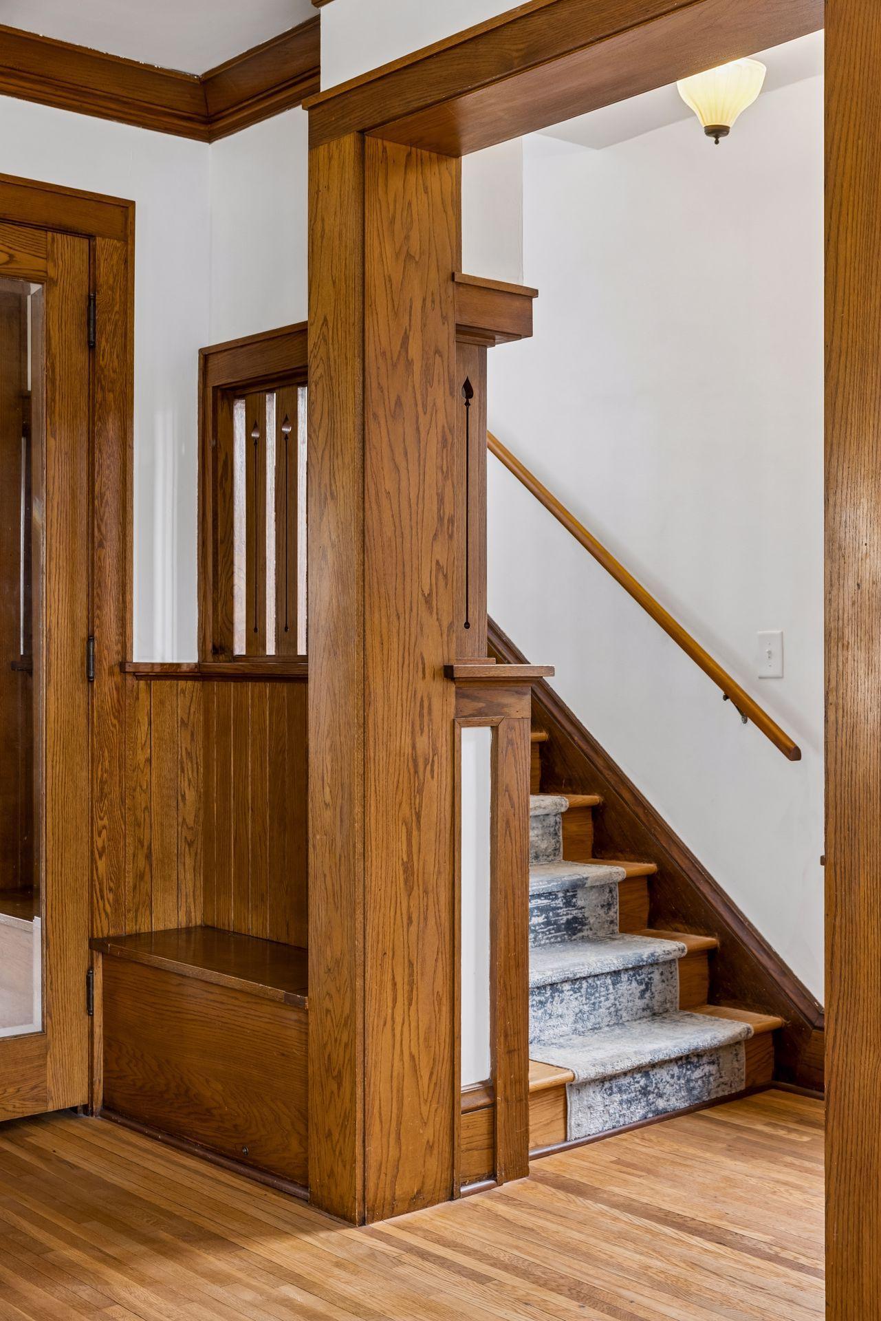 Once inside, you're greeted with incredible original details throughout the main level.