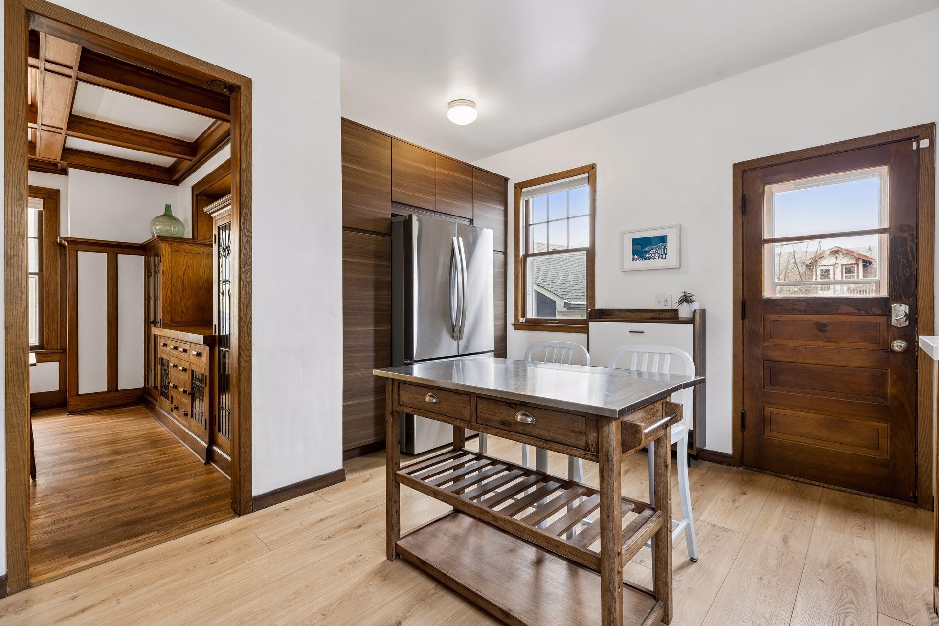 The kitchen is west facing and connects to a deck just outside the door shown in the photo.