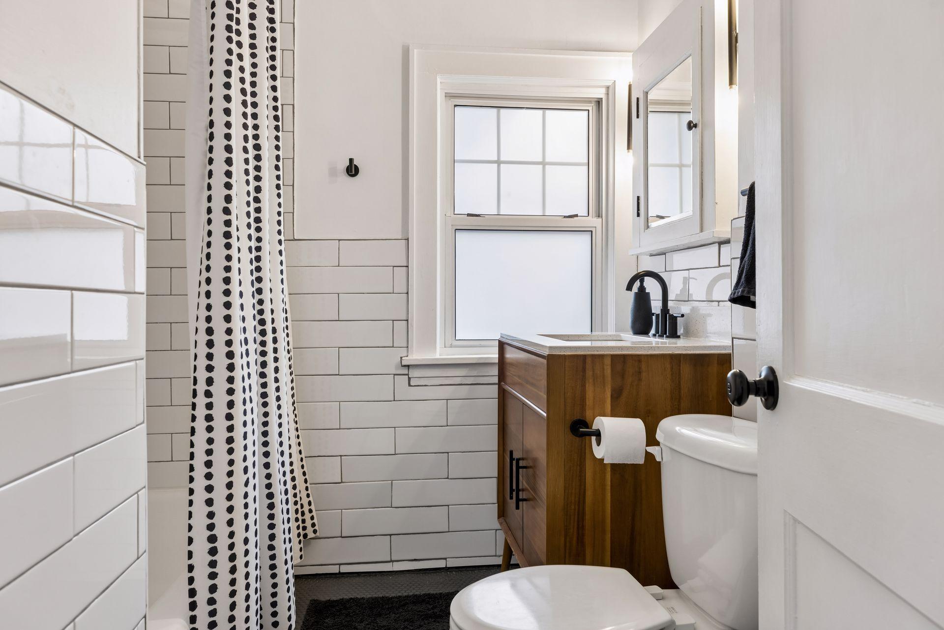 The bathroom is on the upper level and was completely remodeled in 2022