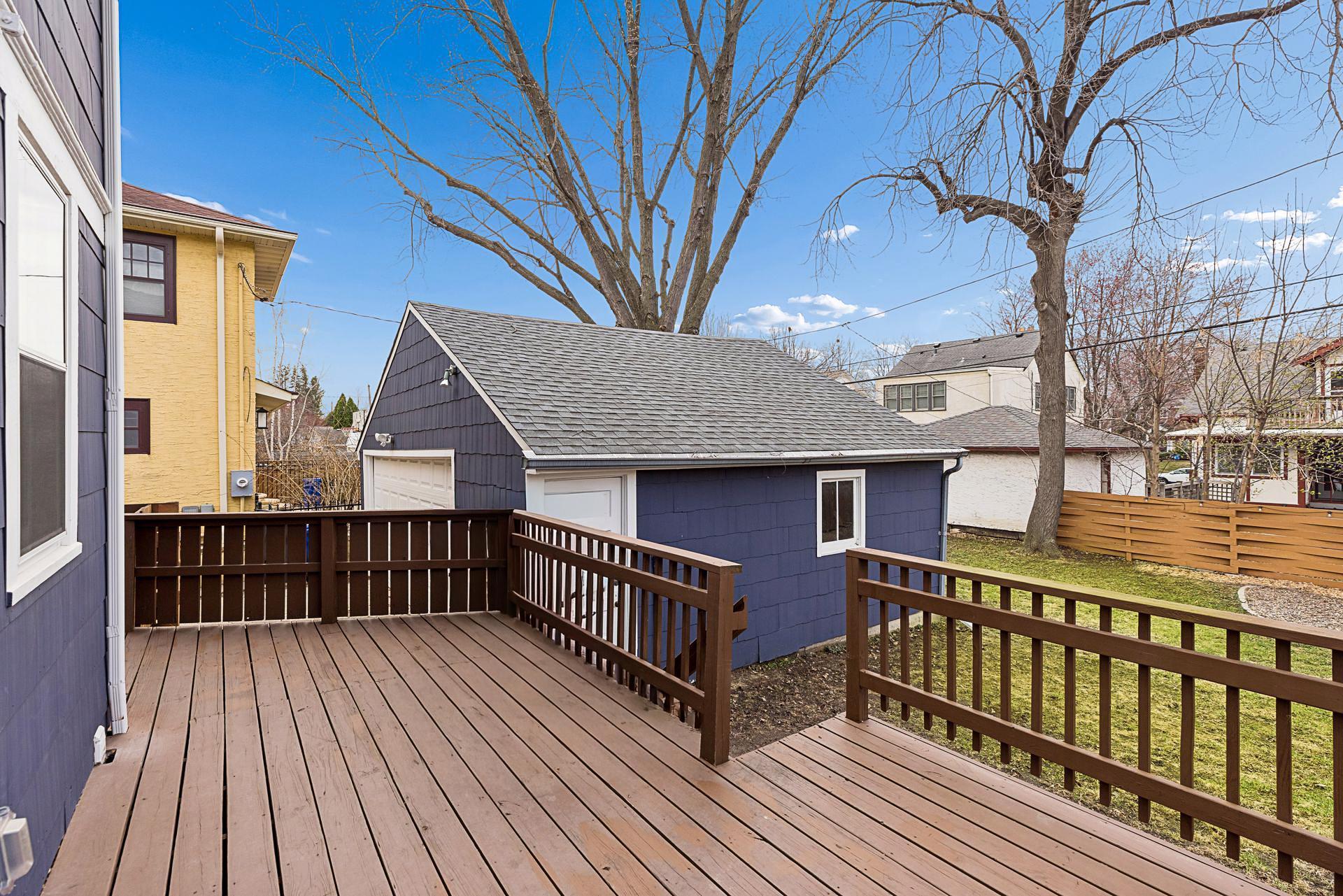 The deck connects to the kitchen for easy indoor/outdoor access.