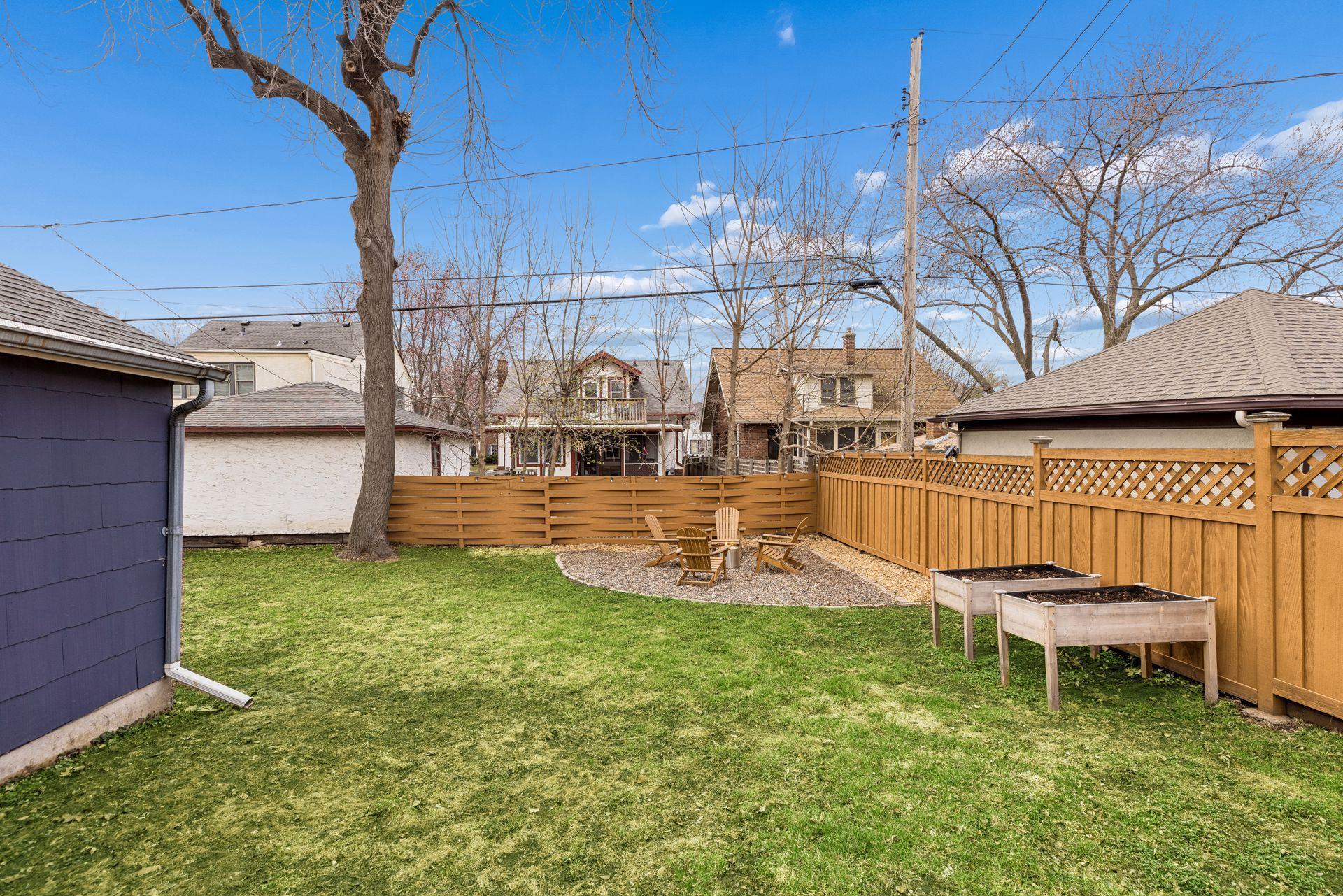 Yard is fully fenced in with a wood privacy fence.