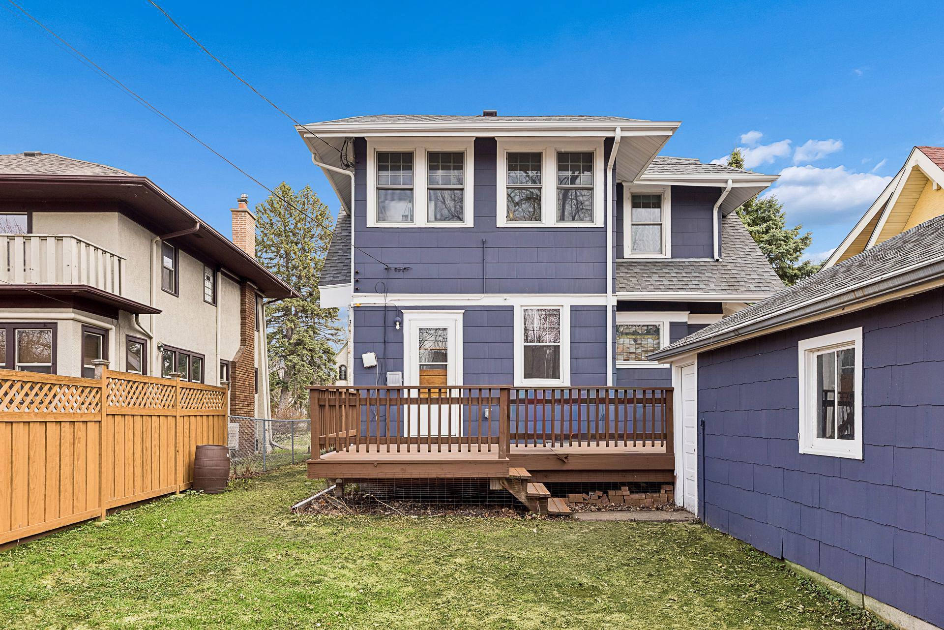 Alternate view of the back of the home and deck.