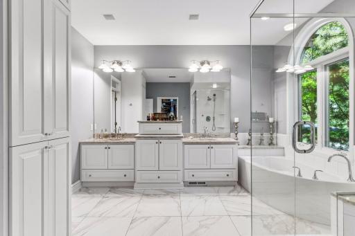 Plenty of counter space, cabinet space, and double sinks