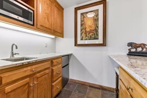 New granite countertops in the kitchenette/bar area