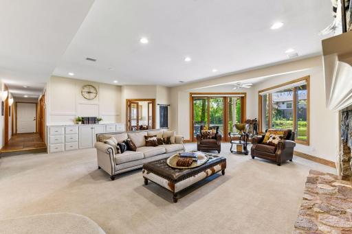 The lower level family room is a great space to gather and entertain