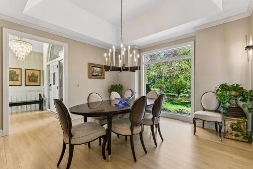 Formal dining room off the entry with oversized window