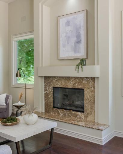 A cozy fireplace anchors the room with warmth and character.