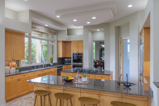 Whether hosting a crowd or enjoying a quiet morning coffee, this thoughtfully designed kitchen offers exceptional functionality wrapped in warmth and natural light.