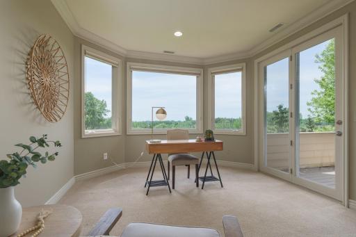 A sun-filled sitting area with panoramic views in every direction.