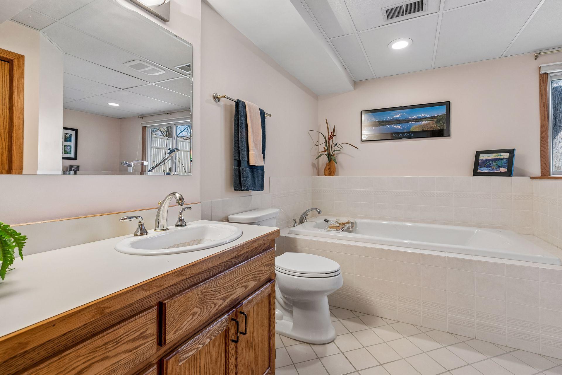 Relax in the lower level bath jetted whirlpool tub!