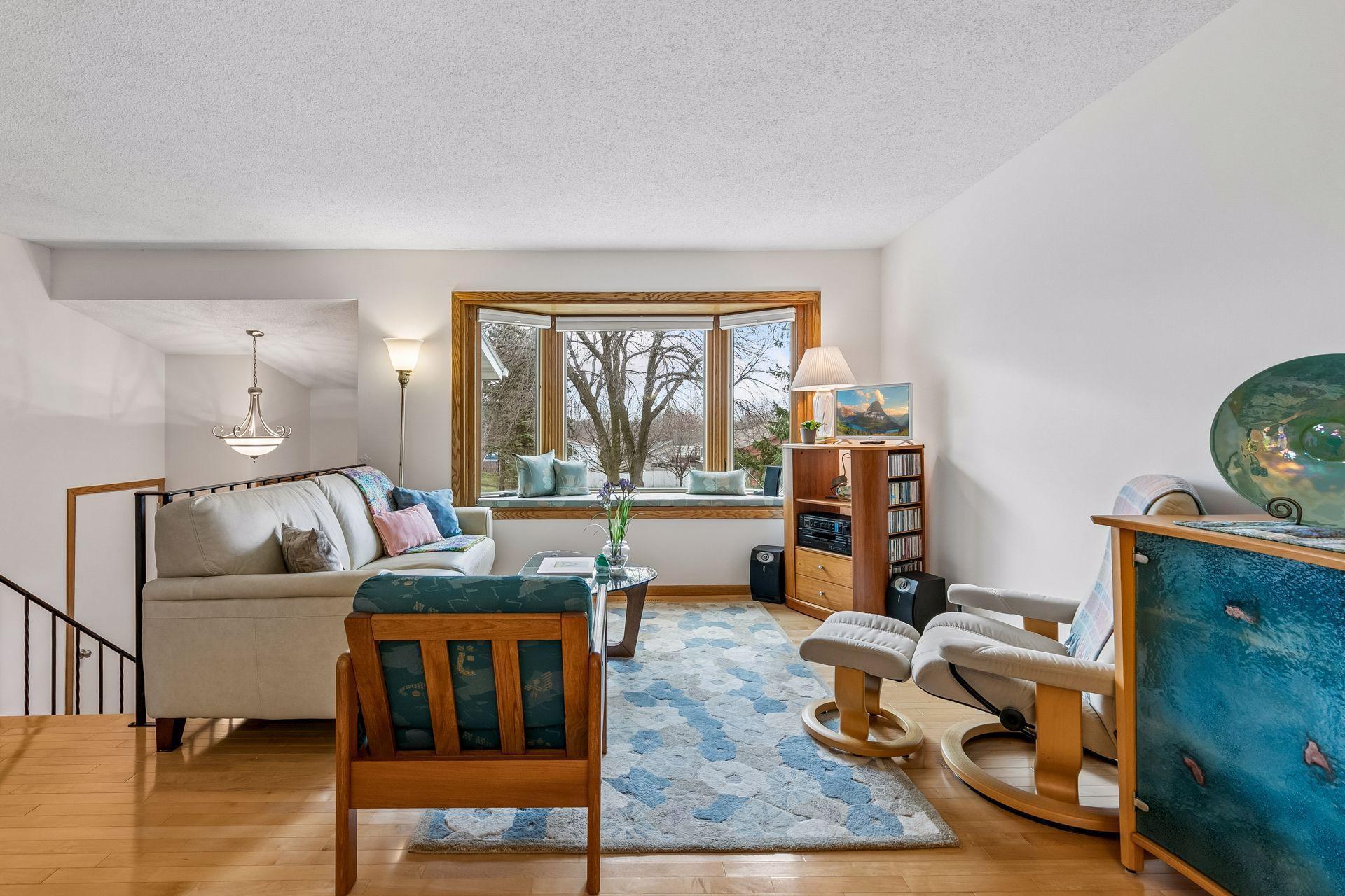 You'll appreciate the large bay window & having updated quality Andersen windows throughout the home!