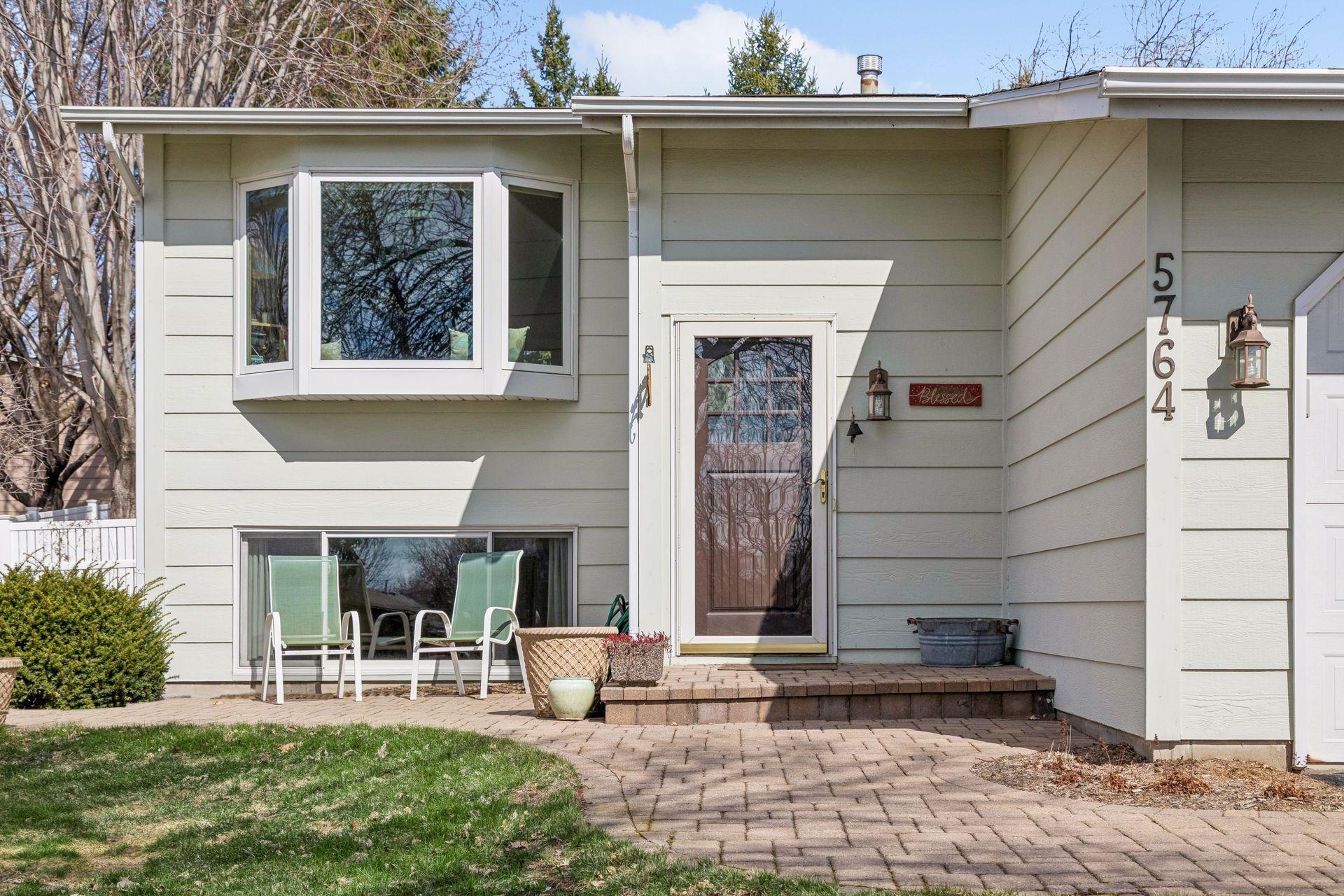 The paver walk-way & newer front door offer a warm first impression!