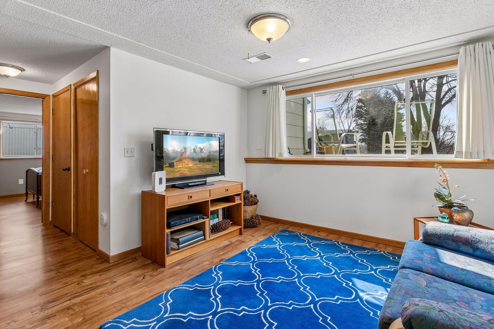 The lower level has large south facing window making it so bright & inviting!