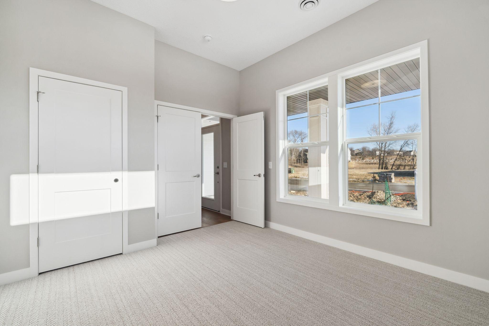 No doors or closet in spec home.