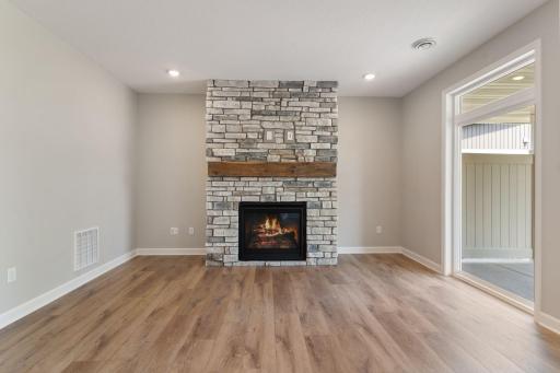 Rustic mantle gives this home a cozy feel