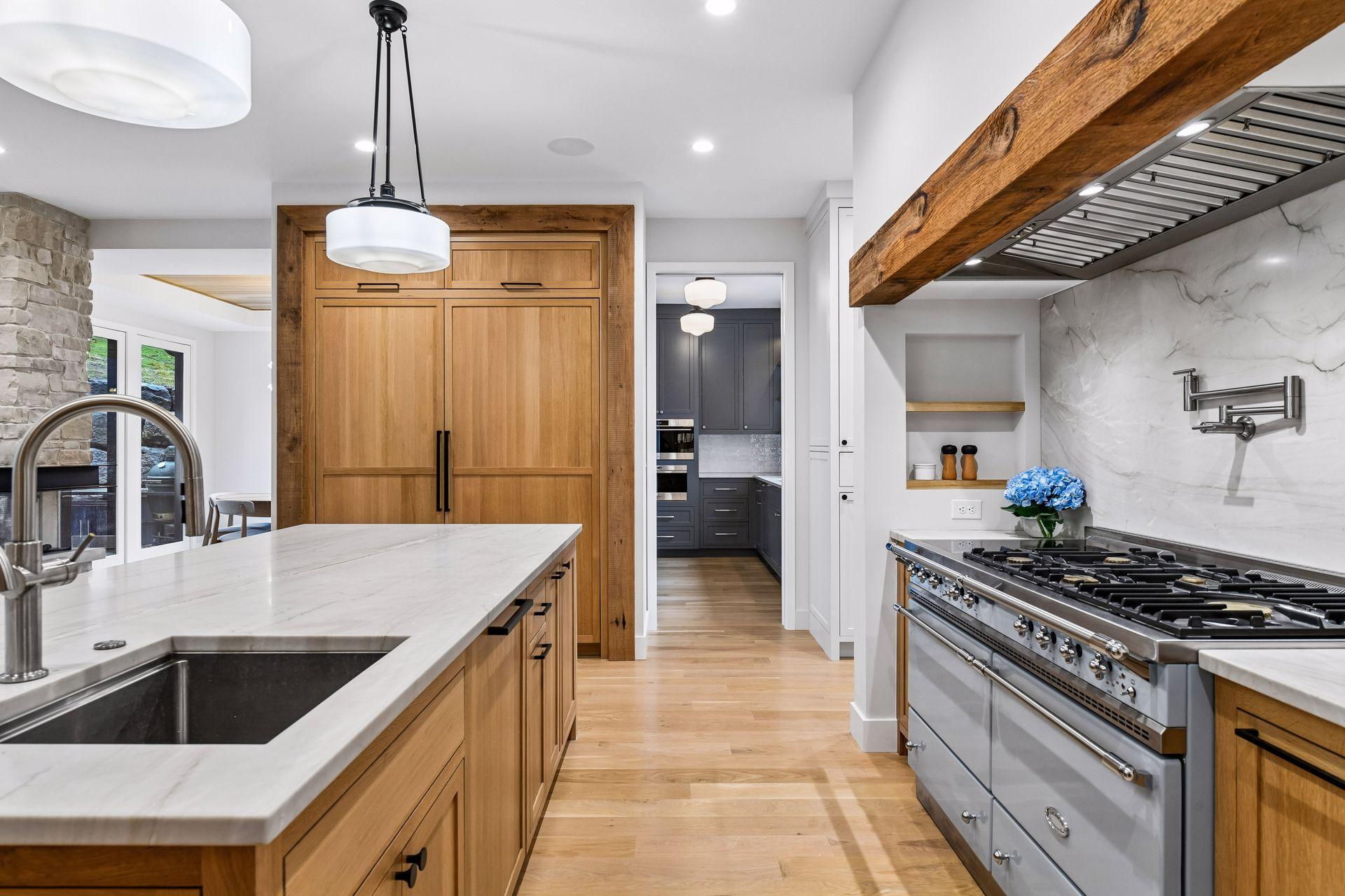 In island knife block, second dishwater, concealed garbage, sheet pan organizer standmixer pull out makes this island particularly well equipt.